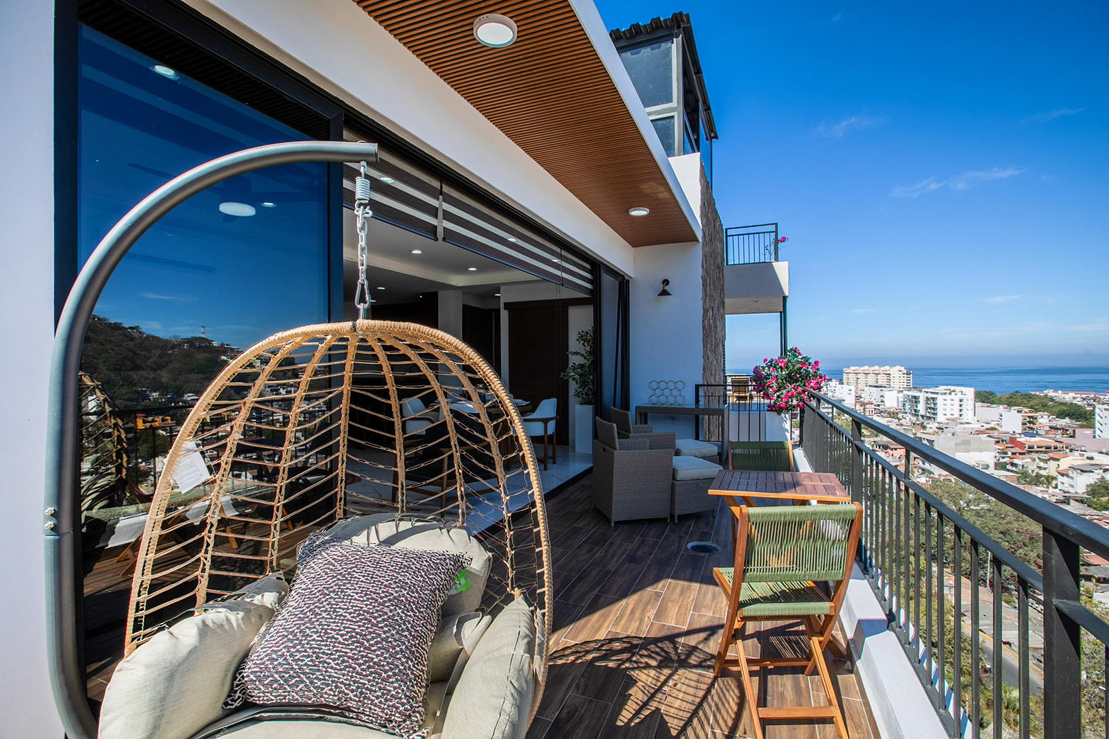 Large terrace with ocean, mountain and city views
